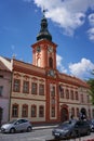 Rakovnik, Czech Republic - July 2, 2022 - the Hus Square with the town hall and historical houses on a sunny summer afternoon