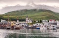 Husavik, Iceland - Fishing boats moored at harbour in subdued light