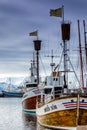 Traditional whale watching boats lying in the harbor of Husavik