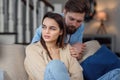 Husband apologizing his offended wife. Misunderstanding in a marriage Royalty Free Stock Photo