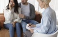 Husband Comforting Crying Wife During Session With Psychologist In Office Royalty Free Stock Photo