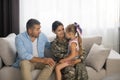 Husband and daughter meeting mother serving in armed forces