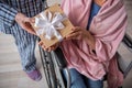 Husband giving a present to his wife Royalty Free Stock Photo