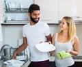 Husband helping girl doing clean up