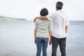 Happy older married man and woman standing on the beach together Royalty Free Stock Photo