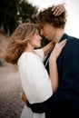 Husband and his wife hug tightly and face each other Royalty Free Stock Photo