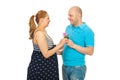 Husband offer pink rose to pregnant wife Royalty Free Stock Photo