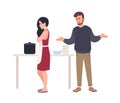 Husband shouting at wife while she is cooking in kitchen. Relationship problem between spouses, romantic partners