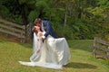 Husband and wife kiss on their wedding Day outdoors Royalty Free Stock Photo