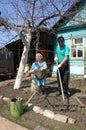 Russian elderly farmers in the country house.