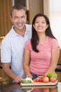 Husband And Wife Preparing Meal Royalty Free Stock Photo