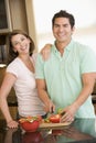 Husband And Wife Preparing A Meal Together Royalty Free Stock Photo