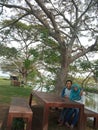 A husband and wife are relaxing at the nature-themed restaurant