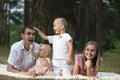 Husband and wife and their little children Royalty Free Stock Photo