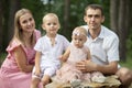 Husband and wife and their little children Royalty Free Stock Photo