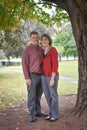 Husband and Wife Under a Tree Royalty Free Stock Photo