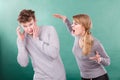 Husband and wife yelling and arguing. Royalty Free Stock Photo