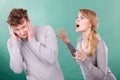 Husband and wife yelling and arguing. Royalty Free Stock Photo