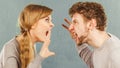 Husband and wife yelling and arguing. Royalty Free Stock Photo