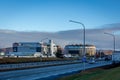 Husgagnahollin shopping center with Kronan supermarket, and round office building in Reykjavik, Iceland. Royalty Free Stock Photo