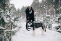 Husky dog and kissing couple in love Royalty Free Stock Photo