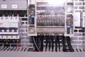 Image shows control cubicle. Schneider circuit breakers and Legrand electric device inside power case.