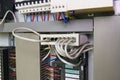 Image shows control cubicle. Schneider multimode fiber switch and Schneider circuit breakers inside power case. Royalty Free Stock Photo