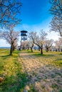 Hustopece, Czech Republic - 23.4.2021: Peoples are visiting the lookout tower and almond orchard near Hustopece city. Almond trees