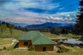 Hut at beautifull hill top in mountains Royalty Free Stock Photo