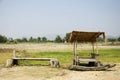 Hut and bench in garden with landscape rice field at Thai Dam Cu Royalty Free Stock Photo