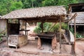 Hut in boca de valeria, brazil. Primitive dwelling hut with dried grass roof. Farm or village in tropic with hut. Eco Royalty Free Stock Photo