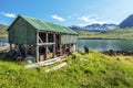 The hut in the border of the fjord Mjoifjordur in Brekkuporp village in Iceland