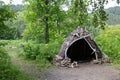 Hut or hovel made of animal skins and bones. Reconstruction of the human home of the Stone Bronze Age. Royalty Free Stock Photo