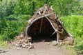 Hut made of animal skins and bones. Reconstruction of the human home of the Stone Bronze Age. Royalty Free Stock Photo