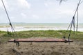 Hut over beautiful beach and tropical sea under bright sunny day Royalty Free Stock Photo