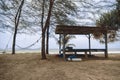 Hut over beautiful beach and tropical sea under bright sunny day Royalty Free Stock Photo