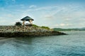 Hut on a rock in the middle of the sea Royalty Free Stock Photo