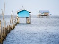 a hut on the sea, it build for protection of the farming seashell and oyster from the theif