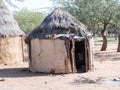 Hut of the tribe of Himba, northern Namibia Royalty Free Stock Photo