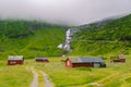 Hut wooden mountain huts in mountain pass Norway. Norwegian landscape with typical scandinavian grass roof houses. Mountain Royalty Free Stock Photo