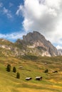 Huts on Seceda mountain under the Odle group