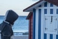 Huts with white and blue strips on the beach Royalty Free Stock Photo