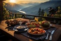 Hutte in Tirol Alm offers a serene sunrise breakfast on its wooden patio Royalty Free Stock Photo