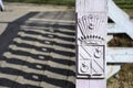 Hutten-Czapsky coat of arms on wooden bridge fence. Stankovo. Belarus. Royalty Free Stock Photo