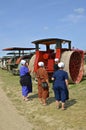 Hutterite women study Avery tractor