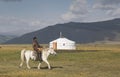 Huvsgul, Mongolia, September 6th, 2017: mongolian man riding a h