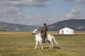 Huvsgul, Mongolia, September 6th, 2017: mongolian man riding a h