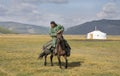 Huvsgul, Mongolia, September 6th, 2017: mongolian man riding a h