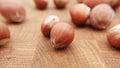 Huzelnut on wooden table. Close up nut with depht of field.