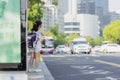 Huzhou, China June 22, 2021: Passenger waiting public transport at bus stop during Coronavirus covid-19 pandemic Royalty Free Stock Photo